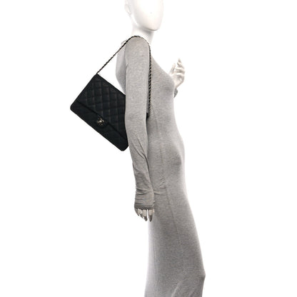 Quilted Caviar Clutch Bag