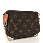 Louis Vuitton Monogram Trunks and Locks Mini Pochette Accessoires
