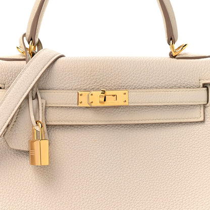 Togo Kelly Retourne 25 Beton Handbag